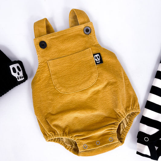 Mustard yellow cord baby romper with front bib pocket
