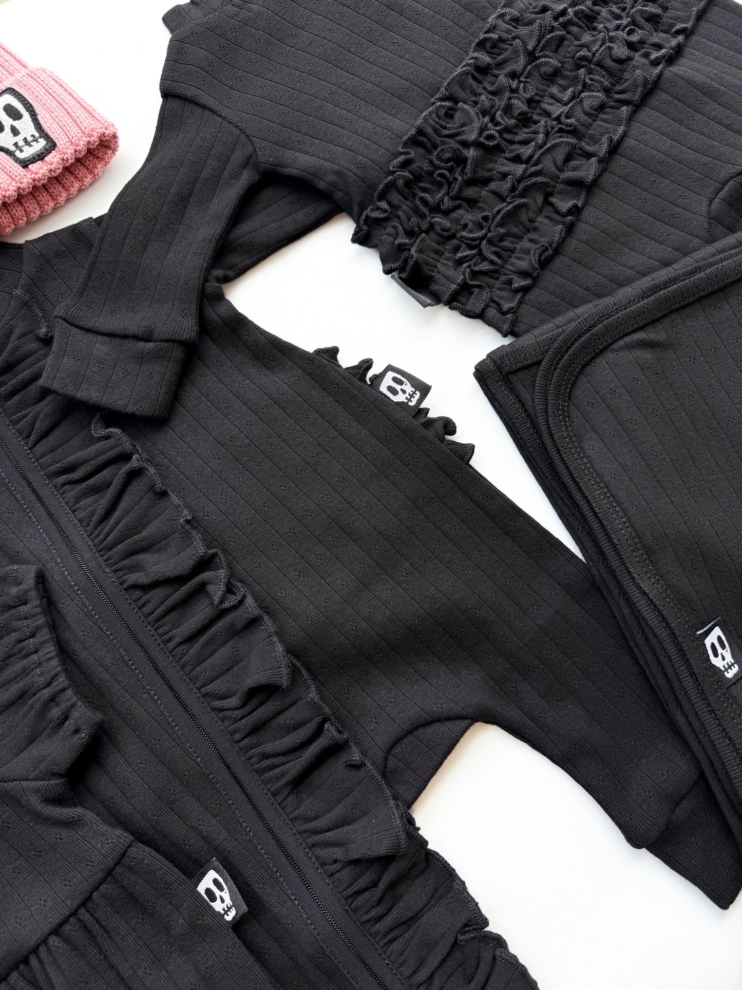 BABY POINTELLE BLACK ZIP UP FRILL FOOTLESS ROMPER