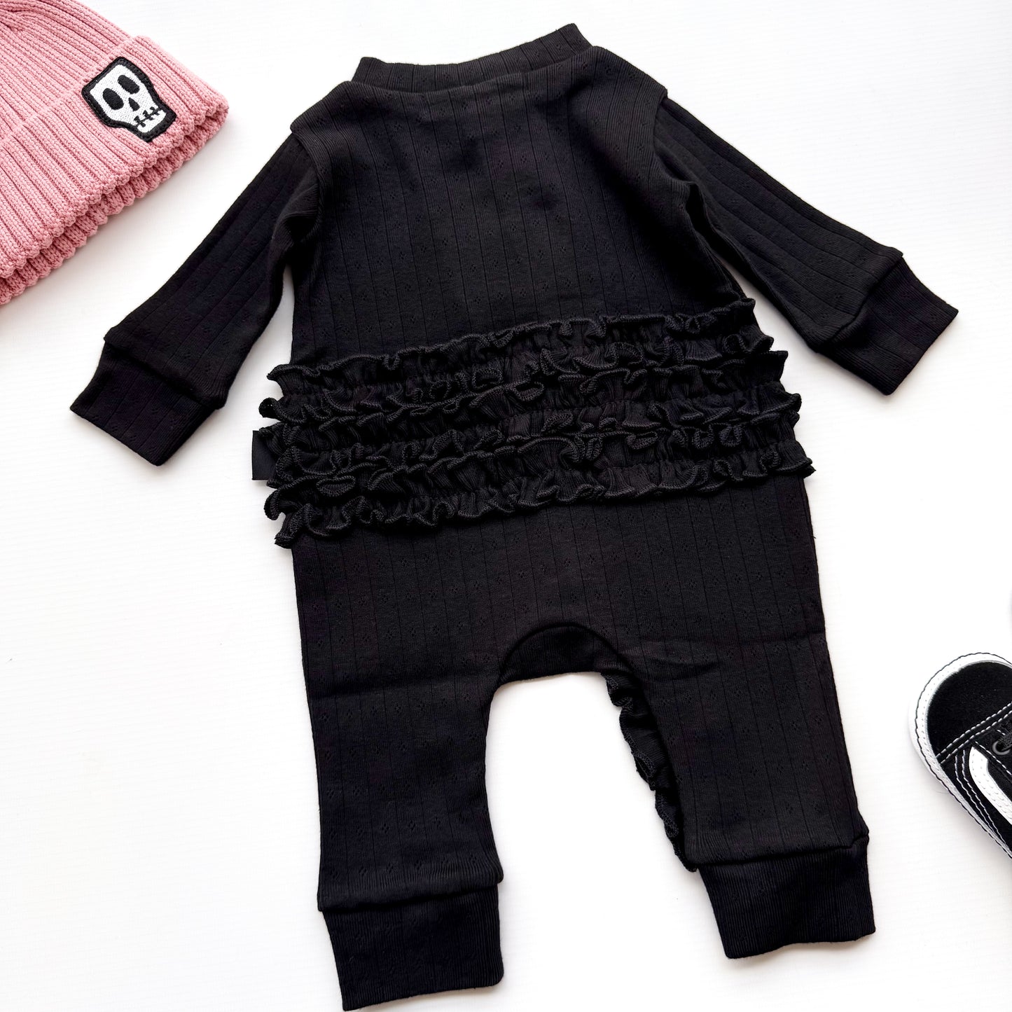 BABY POINTELLE BLACK ZIP UP FRILL FOOTLESS ROMPER