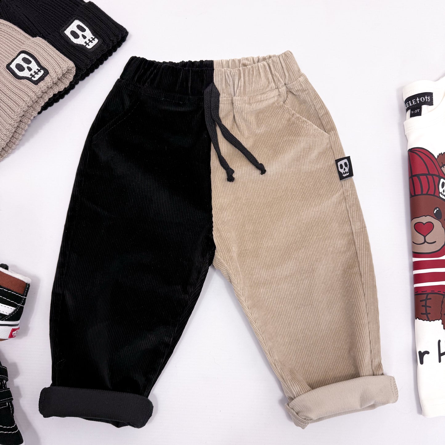 NOT SO BASIC HALF & HALF BEIGE/BLACK CORD TROUSERS