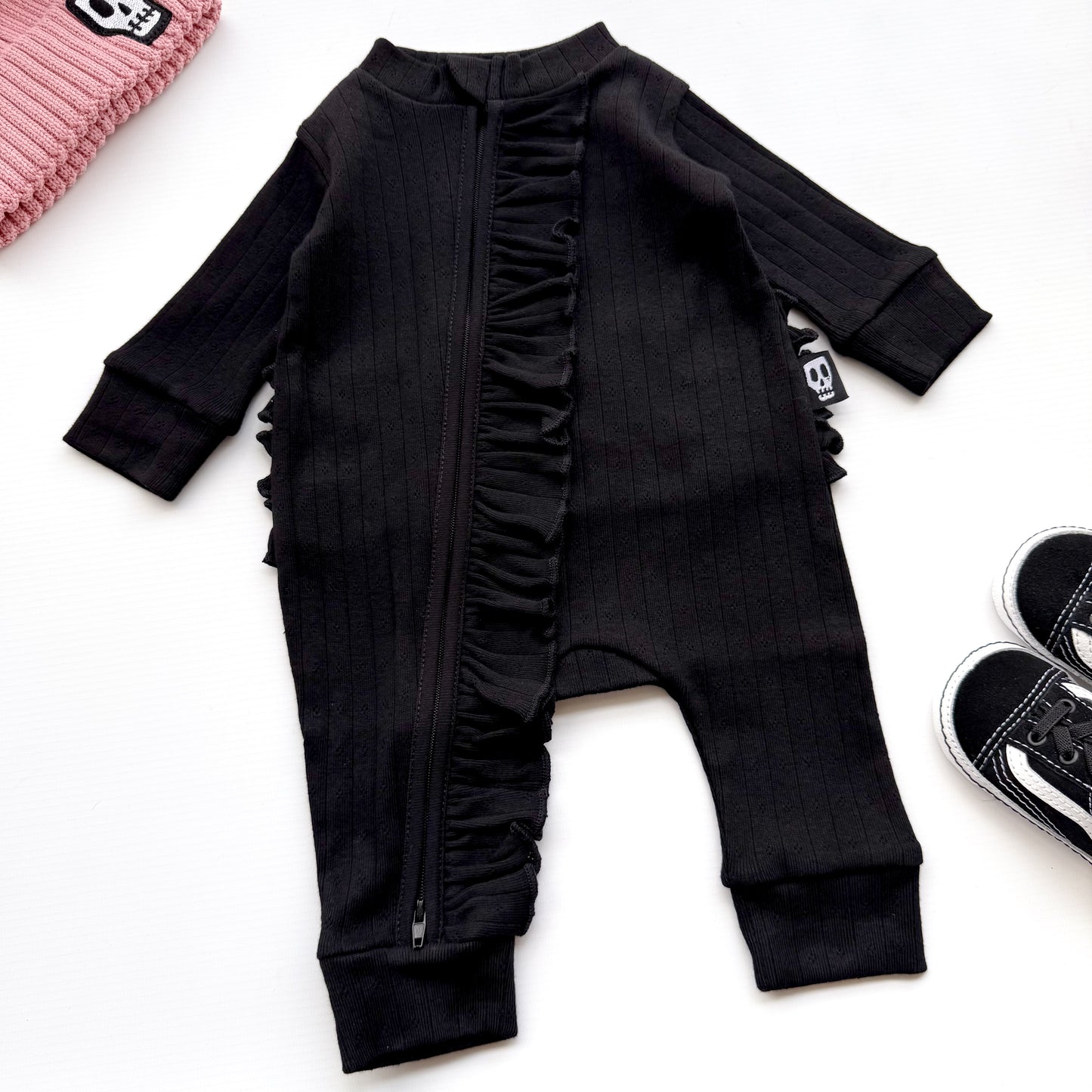 BABY POINTELLE BLACK ZIP UP FRILL FOOTLESS ROMPER