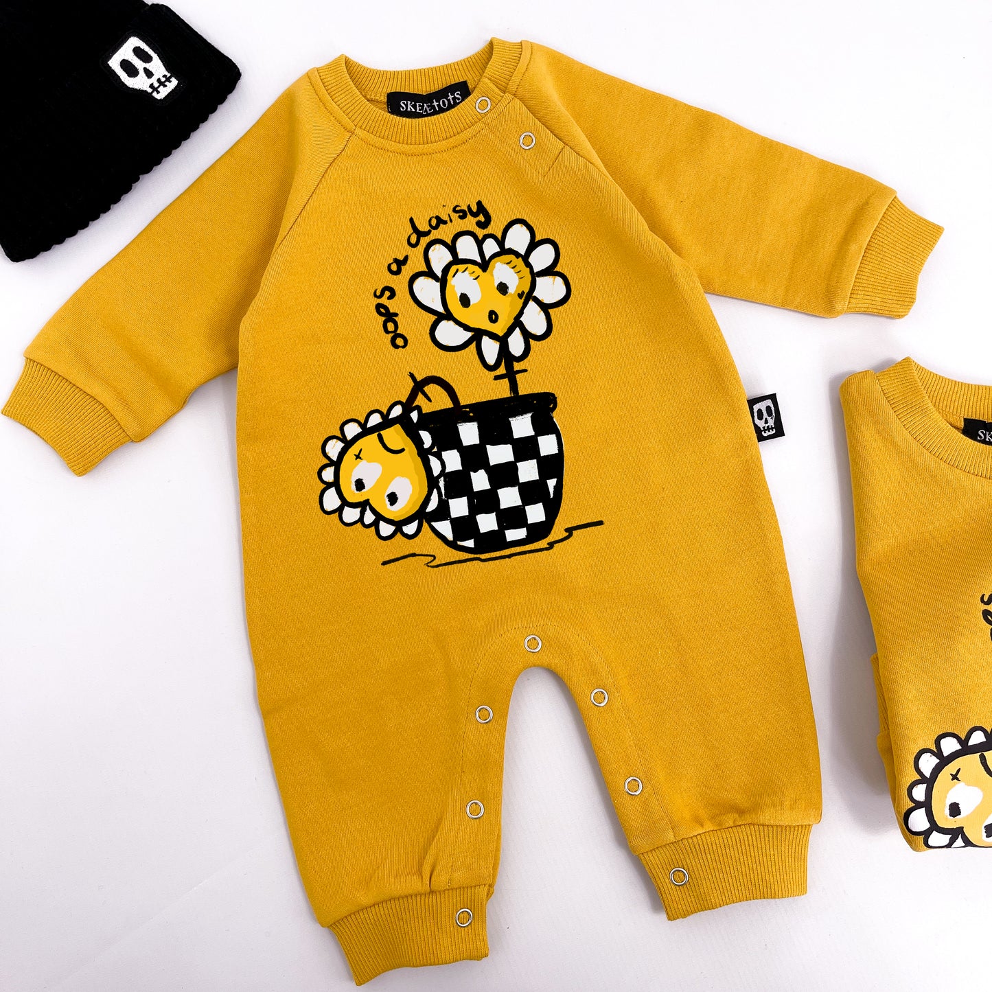 OOPS A DAISY FOOTLESS ROMPER