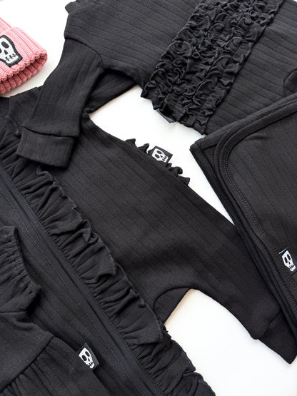 BABY POINTELLE BLACK ZIP UP FRILL FOOTLESS ROMPER