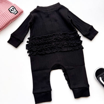 BABY POINTELLE BLACK ZIP UP FRILL FOOTLESS ROMPER