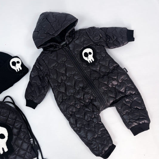 Kids black quilted all in one outerwear with skull patch