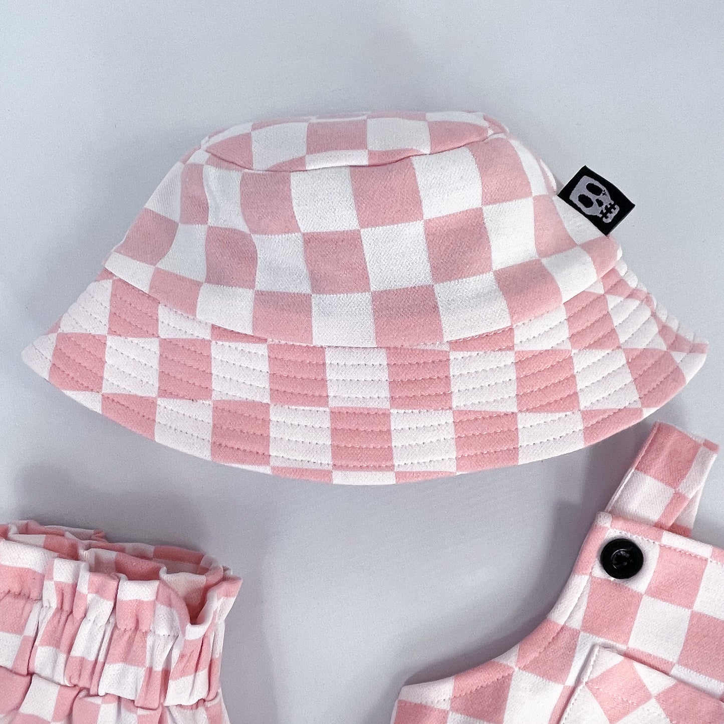 CHECKERBOARD PINK BUCKET HAT