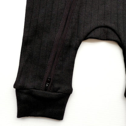 BABY POINTELLE BLACK ZIP UP FOOTLESS ROMPER