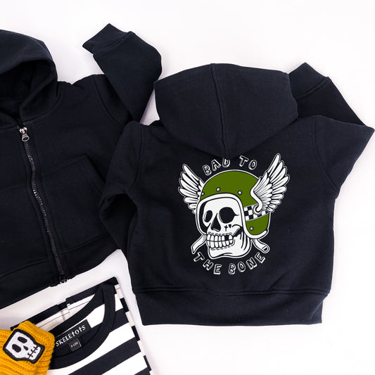 Kids black hoodie with "bad to the bone" printed on and a design of a skull in a winged helmet