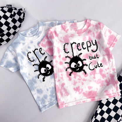 Kids tie dye pink t-shirt with cute spider and "creepy but cute" printed on