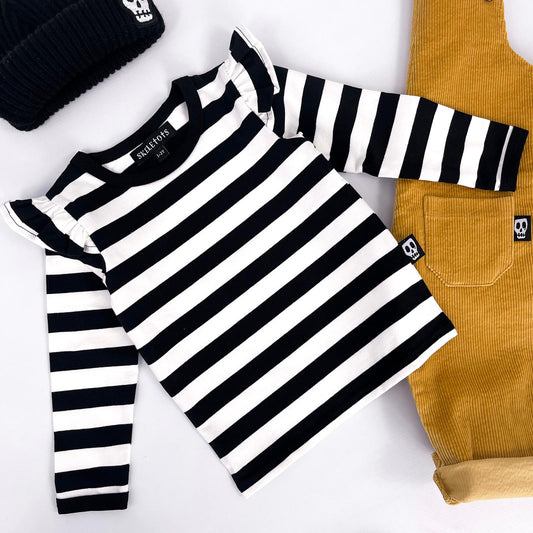 Kids long sleeved t shirt with black and white stripes and frilled sleeves