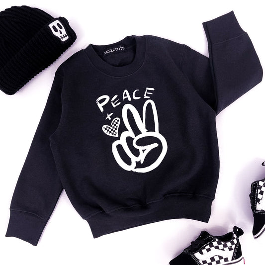 Kids black sweatshirt with design of a hand giving the peace sign and the word "peace"