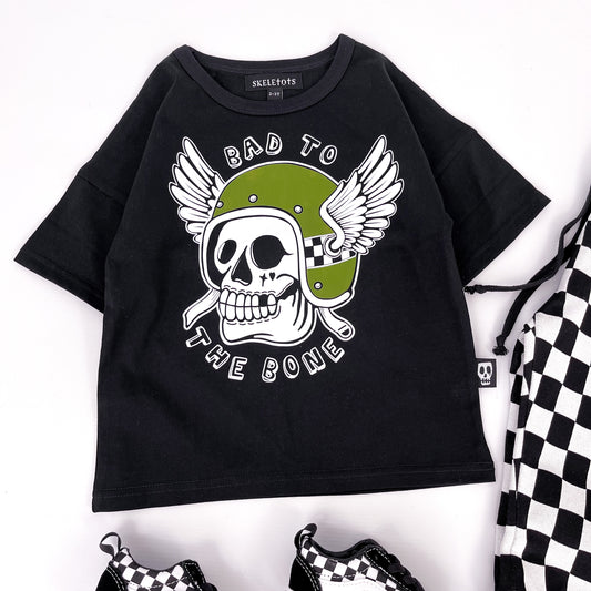 Kids black t shirt with "bad to the bone" printed on and a design of a skull in a winged helmet