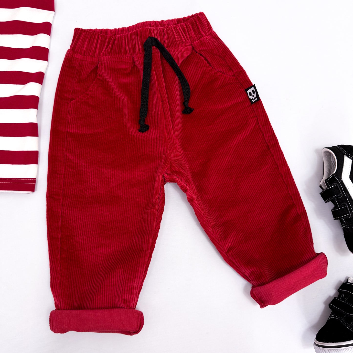 NOT SO BASIC RED CORD TROUSERS