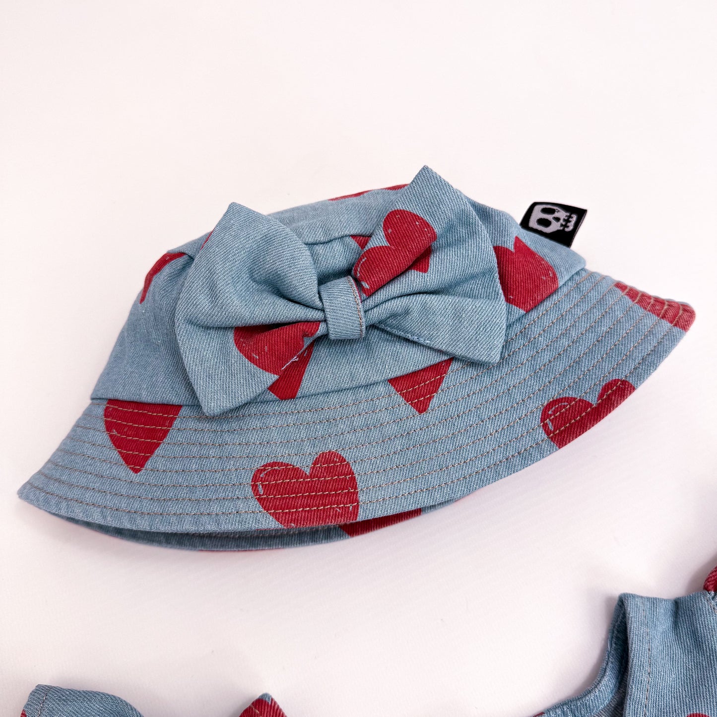 LOVE HEART DENIM BOW BUCKET HAT