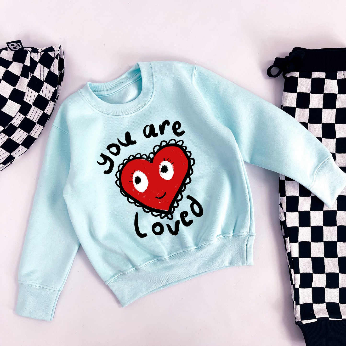 YOU ARE LOVED PASTEL SWEATSHIRT