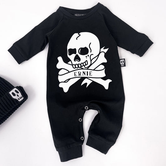 Personalised footless baby romper with skull and crossbones design and custom name printing
