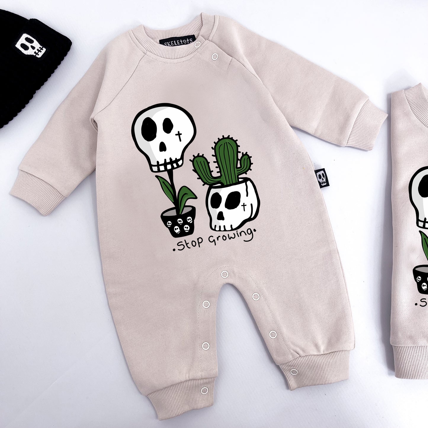 STOP GROWING FOOTLESS ROMPER