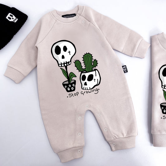 STOP GROWING FOOTLESS ROMPER