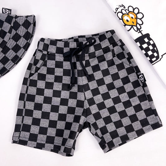 Kids shorts in checkerboard style grey and black