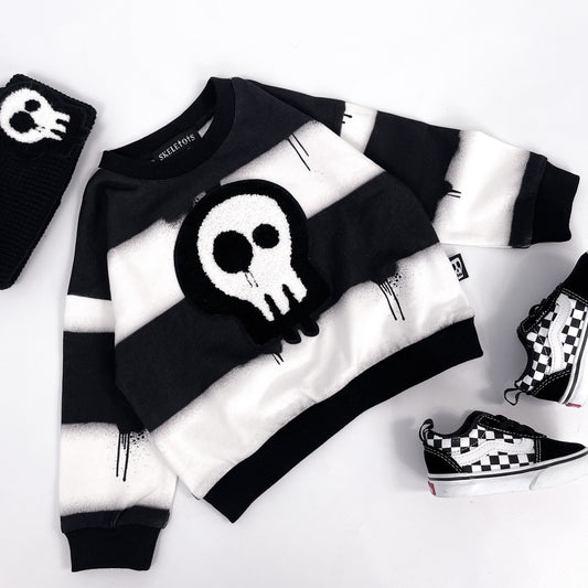 Kids black and white striped sweatshirt with dripping paint design