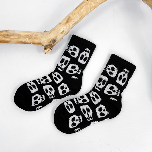 Kids black socks with Skelly Skull design