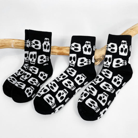 Black socks with Skelly Skull design
